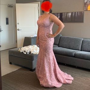 Womens light pink gown with train .